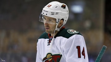 Mar 23, 2015; Toronto, Ontario, CAN; Minnesota Wild forward Justin Fontaine (14) during the pre game warm up against the Toronto Maple Leafs at the Air Canada Centre. Mandatory Credit: John E. Sokolowski-USA TODAY Sports