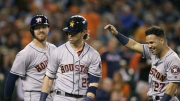 DETROIT, MI - JULY 28: Josh Reddick #22 of the Houston Astros celebrates with Derek Fisher #21 of the Houston Astros, left, and Jose Altuve #27 of the Houston Astros after hitting a three-run home run against the Detroit Tigers during the eighth inning at Comerica Park on July 28, 2017 in Detroit, Michigan. (Photo by Duane Burleson/Getty Images)
