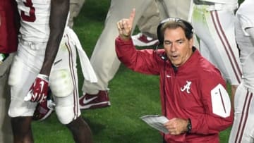 Jan 11, 2016; Glendale, AZ, USA; Alabama Crimson Tide head coach Nick Saban motions after a touchdown during the fourth quarter against the Clemson Tigers in the 2016 CFP National Championship at University of Phoenix Stadium. Mandatory Credit: Gary A. Vasquez-USA TODAY Sports