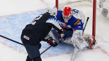 EDMONTON, AB - JANUARY 02: Matthew Boldy #12 of the United States skates against goaltender Simon Latkoczy #30 of Slovakia during the 2021 IIHF World Junior Championship quarterfinals at Rogers Place on January 2, 2021 in Edmonton, Canada. (Photo by Codie McLachlan/Getty Images)