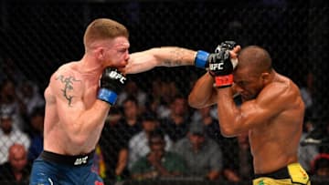 ABU DHABI, UNITED ARAB EMIRATES - SEPTEMBER 07: (L-R) Paul Felder punches Edson Barboza of Brazil in their lightweight bout during UFC 242 at The Arena on September 7, 2019 in Yas Island, Abu Dhabi, United Arab Emirates. (Photo by Jeff Bottari/Zuffa LLC/Zuffa LLC via Getty Images)