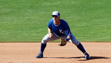GOODYEAR, AZ - MARCH 21: Hunter Dozier #3 of the Kansas City Royals looks on during a game against the Cincinnati Reds at Goodyear Ballpark on March 21, 2014 in Goodyear, Arizona. (Photo by Sarah Glenn/Getty Images)