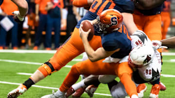 SYRACUSE, NY - NOVEMBER 09: Tabarius Peterson #98 of the Louisville Cardinals sacks Eric Dungey #2 of the Syracuse Orange during the first half at the Carrier Dome on November 9, 2018 in Syracuse, New York. (Photo by Brett Carlsen/Getty Images)