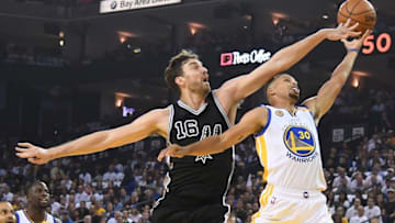 Octobeer 25, 2016; Oakland, CA, USA; Golden State Warriors guard Stephen Curry (30) shoots the ball against San Antonio Spurs center Pau Gasol (16) during the first quarter at Oracle Arena. Mandatory Credit: Kyle Terada-USA TODAY Sports