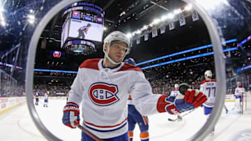 NEW YORK, NEW YORK - MARCH 03: Max Domi #13 of the Montreal Canadiens flips the puck into his own glove during a break in the play against the New York Islanders at the Barclays Center on March 03, 2020 in the Brooklyn borough of New York City. (Photo by Bruce Bennett/Getty Images)