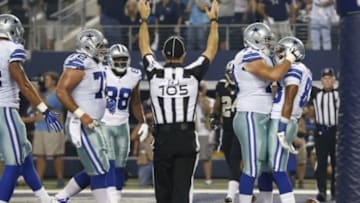 Sep 28, 2014; Arlington, TX, USA; Dallas Cowboys receiver Terrance Williams (83) celebrates his first quarter touchdown catch with guard Zack Martin (70) against the New Orleans Saints at AT&T Stadium. Mandatory Credit: Matthew Emmons-USA TODAY Sports