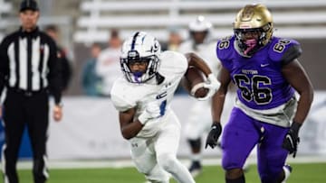 Auburn footballClay-Chalkville's Mario Craver (4) turns up the field after a catch during the Class 6A football state championship at Protective Stadium in Birmingham, Ala., on Friday, Dec. 3, 2021. Clay-Chalkville leads Hueytown 22-14 at halftime.