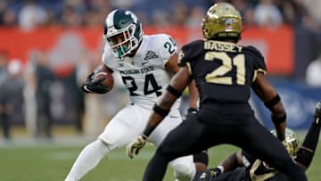 Elijah Collins, Michigan State football (Photo by Adam Hunger/Getty Images)