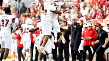 Louisville Cardinals linebacker Dorian Jones and KJ Cloyd celebrate during game against the Florida State Seminoles. USA Today.