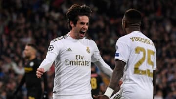 Real Madrid's Spanish midfielder Isco (L) celebrates his goal with Real Madrid's Brazilian forward Vinicius Junior during the UEFA Champions League round of 16 first-leg football match between Real Madrid CF and Manchester City at the Santiago Bernabeu stadium in Madrid on February 26, 2020. (Photo by PIERRE-PHILIPPE MARCOU / AFP) (Photo by PIERRE-PHILIPPE MARCOU/AFP via Getty Images)