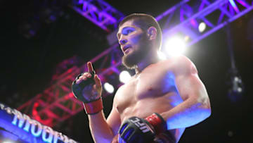NEW YORK, NY - APRIL 07: Khabib Nurmagomedov celebrates his win over Al Iaquinta (not shown) to capture the UFC lightweight championship at UFC 223 at Barclays Center on April 7, 2018 in New York City. (Photo by Ed Mulholland/Getty Images)
