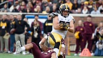 MINNEAPOLIS, MN - OCTOBER 06: T.J. Hockenson #38 of the Iowa Hawkeyes scores a touchdown against Jacob Huff #2 of the Minnesota Golden Gophers during the first quarter of the game on October 6, 2018 at TCF Bank Stadium in Minneapolis, Minnesota. (Photo by Hannah Foslien/Getty Images)