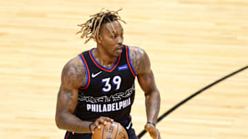 MIAMI, FLORIDA - MAY 13: Dwight Howard #39 of the Philadelphia 76ers in action against the Miami Heat during the first quarter at American Airlines Arena on May 13, 2021 in Miami, Florida. NOTE TO USER: User expressly acknowledges and agrees that, by downloading and or using this photograph, User is consenting to the terms and conditions of the Getty Images License Agreement. (Photo by Michael Reaves/Getty Images)