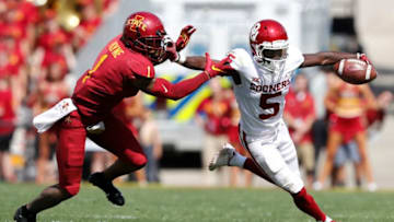 AMES, IA - SEPTEMBER 15: Defensive back D'Andre Payne #1 of the Iowa State Cyclones drives wide receiver Marquise Brown #5 of the Oklahoma Sooners ut of bounds as he rushed for yards in the first half of play at Jack Trice Stadium on September 15, 2018 in Ames, Iowa. .(Photo by David Purdy/Getty Images)