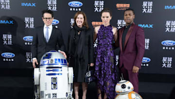 SHANGHAI, CHINA - DECEMBER 27: (CHINA OUT) (L - R) Director J.J. Abrams, producer Kathleen Kennedy, actress Daisy Ridley and actor John Boyega attend 'Star Wars: The Force Awakens' premiere at Shanghai Grand Theatre on December 27, 2015 in Shanghai, China. (Photo by VCG/VCG via Getty Images)