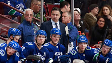 VANCOUVER, BC - DECEMBER 15: Head coach Travis Green of the Vancouver Canucks looks on from the bench during their NHL game against the Philadelphia Flyers at Rogers Arena December 15, 2018 in Vancouver, British Columbia, Canada. Vancouver won 5-1. (Photo by Jeff Vinnick/NHLI via Getty Images)