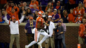 CLEMSON, SOUTH CAROLINA - OCTOBER 26: Wide receiver Diondre Overton #14 of the Clemson Tigers runs in a touchdown reception during the third quarter of their football game against the Boston College Eagles at Memorial Stadium on October 26, 2019 in Clemson, South Carolina. (Photo by Mike Comer/Getty Images)