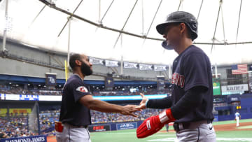 Jul 31, 2022; St. Petersburg, Florida, USA; Cleveland Guardians second baseman Andres Gimenez (0) is congratulated as he scores a run against the Tampa Bay Rays during the fifth inning at Tropicana Field. Mandatory Credit: Kim Klement-USA TODAY Sports
