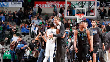 Denver Nuggets v Dallas MavericksDALLAS, TX - MARCH 6: Devin Harris #34 of the Denver Nuggets and Dirk Nowitzki #41 of the Dallas Mavericks exchange a hug after the game between the two teams on March 6, 2018 at the American Airlines Center in Dallas, Texas. NOTE TO USER: User expressly acknowledges and agrees that, by downloading and or using this photograph, User is consenting to the terms and conditions of the Getty Images License Agreement. Mandatory Copyright Notice: Copyright 2018 NBAE (Photo by Danny Bollinger/NBAE via Getty Images)Getty ID: 928322386
