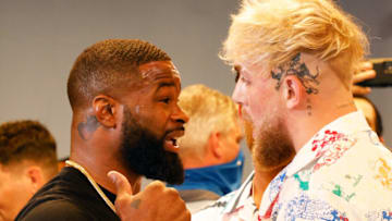 MIAMI, FLORIDA - JUNE 03: Jake Paul and Tyron Woodley take part in media availability at 5th St. Gym ahead of their August 28th boxing match on June 03, 2021 in Miami, Florida. (Photo by Cliff Hawkins/Getty Images)