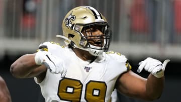 ATLANTA, GA - NOVEMBER 28: Shy Tuttle #99 of the New Orleans Saints reacts following making an interception during the second half of a game against the Atlanta Falcons at Mercedes-Benz Stadium on November 28, 2019 in Atlanta, Georgia. (Photo by Carmen Mandato/Getty Images)