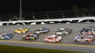Jul 5, 2015; Daytona Beach, FL, USA; NASCAR Sprint Cup Series drivers race during the Coke Zero 400 at Daytona International Speedway. Mandatory Credit: Jasen Vinlove-USA TODAY Sports