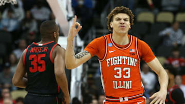 Mar 20, 2022; Pittsburgh, PA, USA; Illinois Fighting Illini forward Coleman Hawkins (33) reacts against the Houston Cougars in the first half during the second round of the 2022 NCAA Tournament at PPG Paints Arena. Mandatory Credit: Charles LeClaire-USA TODAY Sports