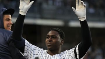 NEW YORK, NEW YORK - OCTOBER 05: Didi Gregorius #18 of the New York Yankees salutes the crowd after his grand slam home run off Tyler Duffey #21 of the Minnesota Twins in the third inning in game two of the American League Division Series at Yankee Stadium on October 05, 2019 in New York City. (Photo by Elsa/Getty Images)