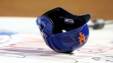Aug. 9, 2013; Phoenix, AZ, USA: Detailed view of a New York Mets helmet laying in the on deck circle against the Arizona Diamondbacks at Chase Field. Mandatory Credit: Mark J. Rebilas-USA TODAY Sports
