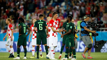 KALININGRAD, RUSSIA - JUNE 16: Mario Mandzukic of Croatia consoles Bryan Idowu of Nigeria after the 2018 FIFA World Cup Russia group D match between Croatia and Nigeria at Kaliningrad Stadium on June 16, 2018 in Kaliningrad, Russia. (Photo by Julian Finney/Getty Images)