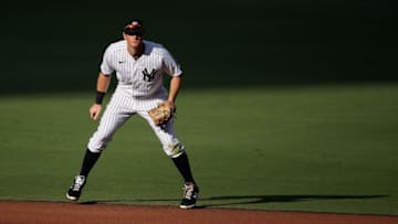 SAN DIEGO, CALIFORNIA - OCTOBER 07: DJ LeMahieu of the New York Yankees fields in Game Three of the American League Division Series. (Photo by Christian Petersen/Getty Images)