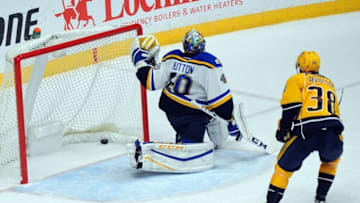 Nov 10, 2016; Nashville, TN, USA; St. Louis Blues goalie Carter Hutton (40) allows a goal during the second period against the Nashville Predators at Bridgestone Arena. Mandatory Credit: Christopher Hanewinckel-USA TODAY Sports