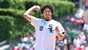 CHICAGO, ILLINOIS - MAY 20: NBA prospect Jalen Wilson throws a ceremonial first pitch before the game between the Chicago White Sox and the Kansas City Royals at Guaranteed Rate Field on May 20, 2023 in Chicago, Illinois. (Photo by Quinn Harris/Getty Images)