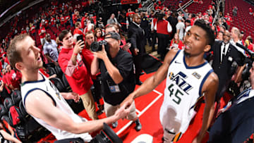 HOUSTON, TX - MAY 2: Joe Ingles #2 and Donovan Mitchell #45 of the Utah Jazz exchange a handshake after Game Two of Round Two of the 2018 NBA Playoffs against the Houston Rockets on May 2, 2018 at Toyota Center in Houston, TX. NOTE TO USER: User expressly acknowledges and agrees that, by downloading and or using this Photograph, user is consenting to the terms and conditions of the Getty Images License Agreement. Mandatory Copyright Notice: Copyright 2018 NBAE (Photo by Andrew D. Bernstein/NBAE via Getty Images)