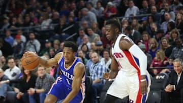 Jan 27, 2016; Auburn Hills, MI, USA; Philadelphia 76ers guard Ish Smith (1) drives the ball to the basket as Detroit Pistons guard Reggie Jackson (1) defends during the second quarter of the game at The Palace of Auburn Hills. Mandatory Credit: Leon Halip-USA TODAY Sports