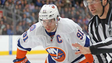 TORONTO, ON - MARCH 9: John Tavares #91 of the New York Islanders gets set for a faceoff against the Toronto Maple Leafs during an NHL game at the Air Canada Centre on March 9, 2015 in Toronto, Ontario, Canada. The Islanders defeated the Maple Leafs 4-3 in overtime. (Photo by Claus Andersen/Getty Images)
