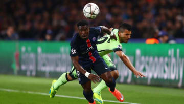 PARIS, FRANCE - APRIL 06: Serge Aurier of Paris Saint-Germain and Sergio Aguero of Manchester City compete for the ball during the UEFA Champions League Quarter Final First Leg match between Paris Saint-Germain and Manchester City at Parc des Princes on April 6, 2016 in Paris, France. (Photo by Clive Rose/Getty Images)
