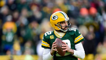 GREEN BAY, WISCONSIN - NOVEMBER 28: Aaron Rodgers #12 of the Green Bay Packers looks on during pregame warm-ups before the game against the Los Angeles Rams at Lambeau Field on November 28, 2021 in Green Bay, Wisconsin. (Photo by Patrick McDermott/Getty Images)