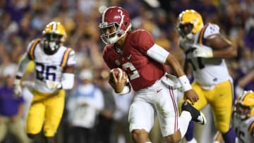 Nov 5, 2016; Baton Rouge, LA, USA; Alabama Crimson Tide quarterback Jalen Hurts (2) carries for a 21 yard touchdown against the LSU Tigers during the fourth quarter at Tiger Stadium. Mandatory Credit: John David Mercer-USA TODAY Sports