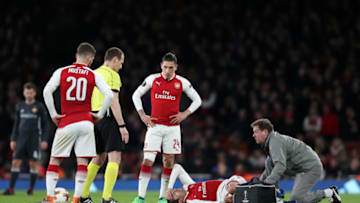 LONDON, ENGLAND - APRIL 05: Henrikh Mkhitaryan of Arsenal lies injured during the UEFA Europa League quarter final leg one match between Arsenal FC and CSKA Moskva at Emirates Stadium on April 5, 2018 in London, United Kingdom. (Photo by Dan Istitene/Getty Images,)