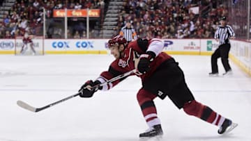 Nov 23, 2016; Glendale, AZ, USA; Arizona Coyotes right wing Radim Vrbata (17) shoots the puck during the second period against the Vancouver Canucks at Gila River Arena. Mandatory Credit: Matt Kartozian-USA TODAY Sports