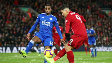 LIVERPOOL, ENGLAND - JANUARY 30: Roberto Firmino of Liverpool battles for possession with Ricardo Pereira of Leicester City during the Premier League match between Liverpool FC and Leicester City at Anfield on January 30, 2019 in Liverpool, United Kingdom. (Photo by Clive Brunskill/Getty Images)