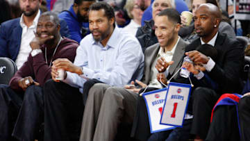 Ben Wallace and Rasheed Wallace and Tayshaun Prince and Richard Hamilton smile and look on during the second quarter in the game between the Detroit Pistons and the Denver Nuggets Credit: Raj Mehta-USA TODAY Sports