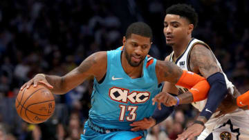 DENVER, COLORADO - FEBRUARY 26: Paul George #13 of the Oklahoma City Thunder drives against Gary Harris #14 of the Denver Nuggets in the second quarter at the Pepsi Center on February 26, 2019 in Denver, Colorado. NOTE TO USER: User expressly acknowledges and agrees that, by downloading and or using this photograph, User is consenting to the terms and conditions of the Getty Images License Agreement. (Photo by Matthew Stockman/Getty Images)