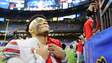 NEW ORLEANS, LOUISIANA - JANUARY 01: Justin Fields #1 of the Ohio State Buckeyes reacts after defeating the Clemson Tigers 49-28 during the College Football Playoff semifinal game at the Allstate Sugar Bowl at Mercedes-Benz Superdome on January 01, 2021 in New Orleans, Louisiana. (Photo by Kevin C. Cox/Getty Images)