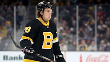 BOSTON, MASSACHUSETTS - FEBRUARY 15: Charlie McAvoy #73 of the Boston Bruins looks on during the first period at TD Garden on February 15, 2020 in Boston, Massachusetts. (Photo by Maddie Meyer/Getty Images)