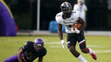 Nov 28, 2015; Greenville, NC, USA; Cincinnati Bearcats wide receiver Mekale McKay (2) runs with the ball after his 4th quarter catch against the East Carolina Pirates at Dowdy-Ficklen Stadium. The Cincinnati Bearcats defeated the East Carolina Pirates 19-16. Mandatory Credit: James Guillory-USA TODAY Sports