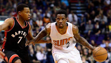 Dec 29, 2016; Phoenix, AZ, USA; Phoenix Suns guard Eric Bledsoe (2) handles the ball against Toronto Raptors guard Kyle Lowry (7) in the second half of the NBA game at Talking Stick Resort Arena. The Suns won 99-91. Mandatory Credit: Jennifer Stewart-USA TODAY Sports