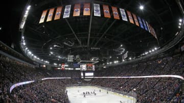 Apr 2, 2016; Edmonton, Alberta, CAN; The opening face-off for the last "Battle of Alberta" between the Edmonton Oilers and Calgary Flames at Rexall Place. Mandatory Credit: Perry Nelson-USA TODAY Sports
