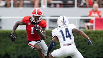 ATHENS, GA - SEPTEMBER 10: Marcus Rosemy-Jacksaint #1 of the Georgia Bulldogs prepares to take on Torrence Pollard #14 of the Samford Bulldogs during a game between Samford Bulldogs and Georgia Bulldogs at Sanford Stadium on September 10, 2022 in Athens, Georgia. (Photo by Steve Limentani/ISI Photos/Getty Images)